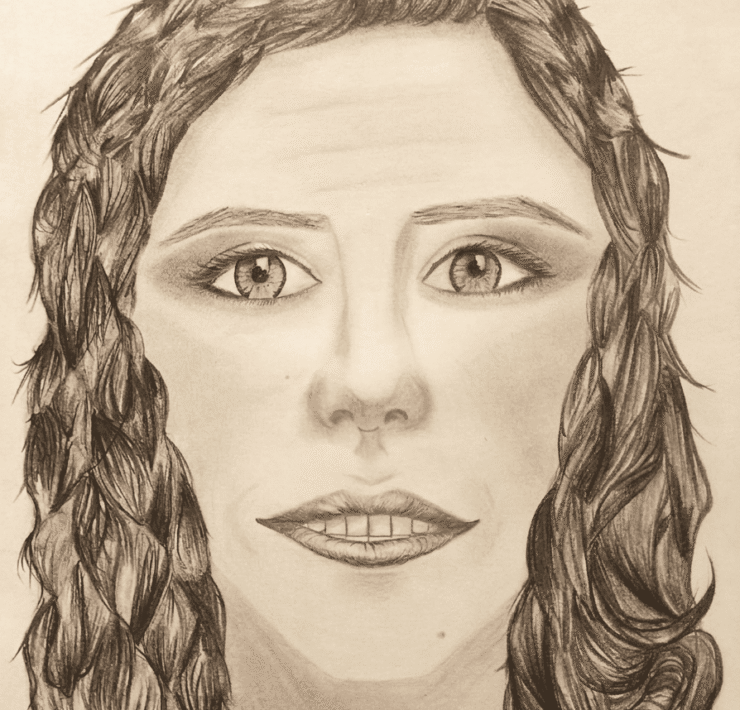 Ilustración realizada a lápiz en grafito sobre fondo blanco. Se presenta un retrato frontal en primer plano del rostro de una mujer de cabello oscuro, ondulado y peinado hacia atrás. Sus ojos abiertos miran fijamente al frente con una expresión intensa que transmite resolución frente al juicio social a la mujer, con trazos sombreados marcados en las cejas, la nariz y los labios.